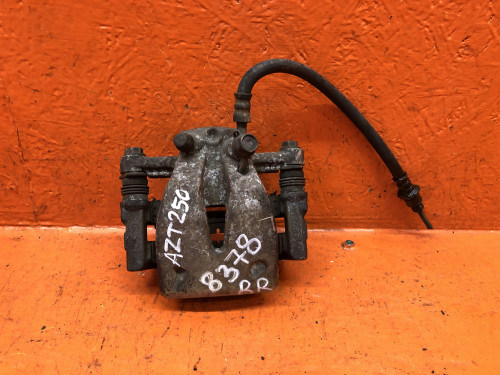 Суппорт тормозной задний правый TOYOTA AVENSIS AZT25*