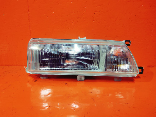 Фара передняя правая TOYOTA CARIB AE95G ST12331R
