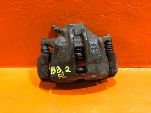 Суппорт тормозной передний левый AUDI 80 1986-1991