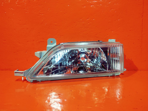 Фара передняя левая TOYOTA CARINA *T21* NLC1033