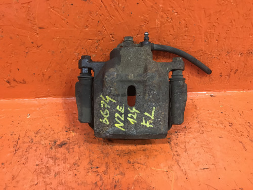 Суппорт тормозной передний левый TOYOTA ALLEX/RUNX *E12*