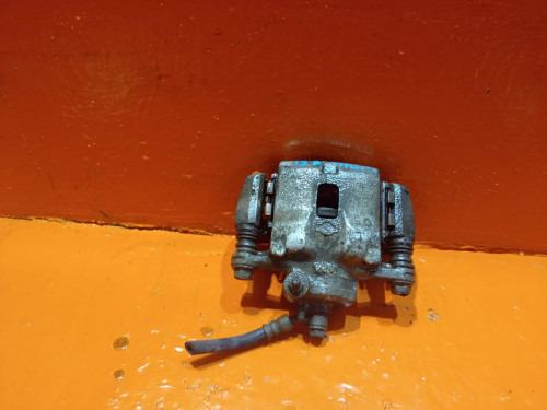 Суппорт тормозной передний левый NISSAN AD Y10 4101150Y00