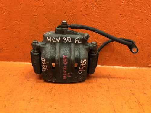 Суппорт тормозной передний левый TOYOTA WINDOM MCV30