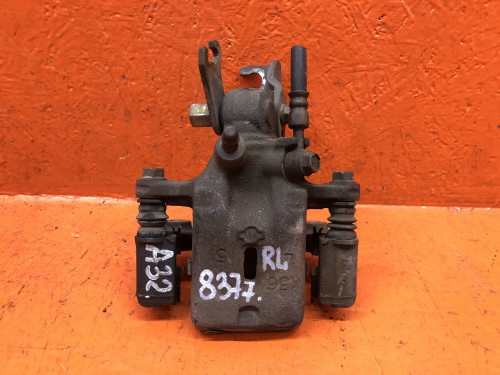 Суппорт тормозной задний левый NISSAN CEFIRO A32