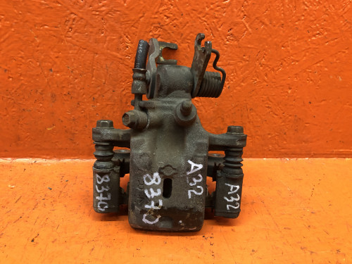 Суппорт тормозной задний правый NISSAN CEFIRO A32