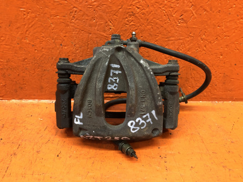 Суппорт тормозной передний левый TOYOTA AVENSIS 2003-2008