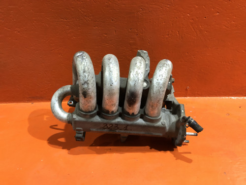 Коллектор впускной MAZDA 323 1998-2002 ZL06-13-100D