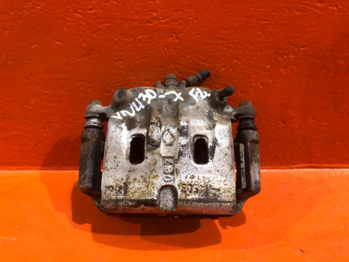 Суппорт тормозной передний левый NISSAN BASSARA U30 410114N000