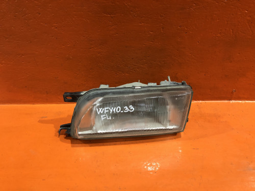 Фара передняя левая NISSAN WINGROAD Y10 26060-4H125