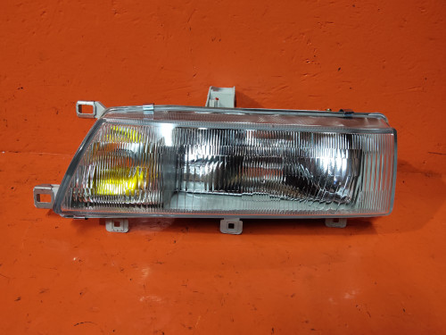 Фара передняя левая TOYOTA CARIB AE95G NLC1123