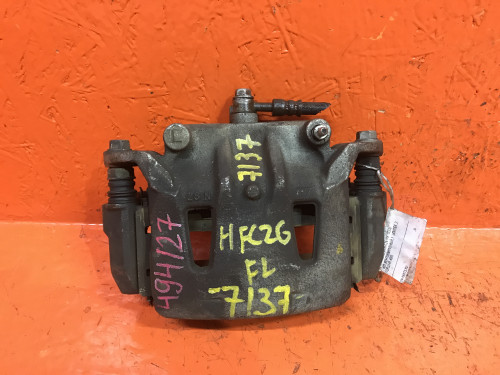 Суппорт тормозной передний левый NISSAN SERENA *C26