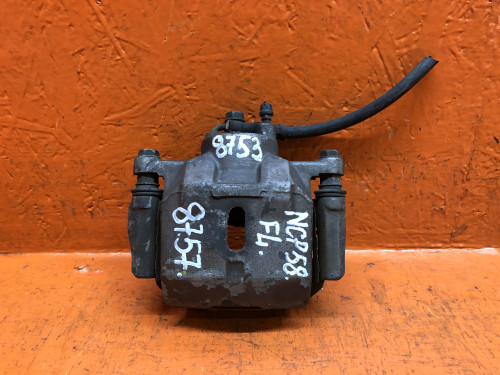 Суппорт тормозной передний левый TOYOTA PROBOX 