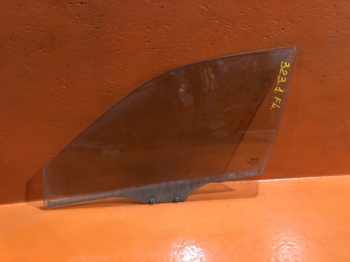 Стекло двери передней левой MAZDA 323 1998-2002 B25D-59-511B