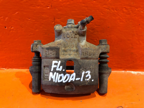 Суппорт тормозной передний левый TOYOTA DUET